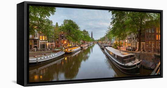 Prinsengracht Canal at Dusk with Westerkerk in Distance, Amsterdam, North Holland, Netherlands-null-Framed Stretched Canvas