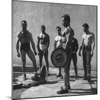 Prisoners at San Quentin Weightlifting in Prison Yard During Recreation Period-Charles E^ Steinheimer-Mounted Photographic Print