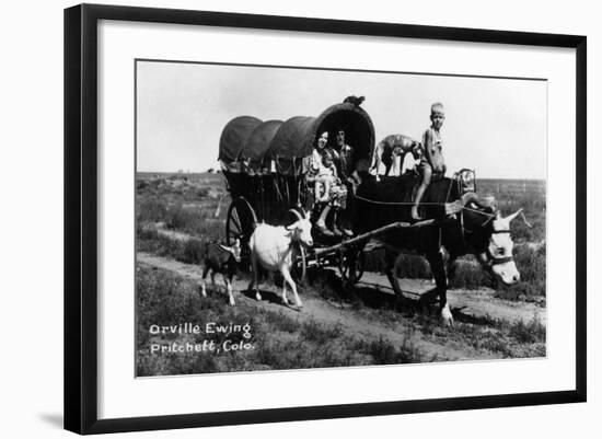 Pritchett, Colorado - Orville Ewing; Covered Wagon Scene-Lantern Press-Framed Art Print