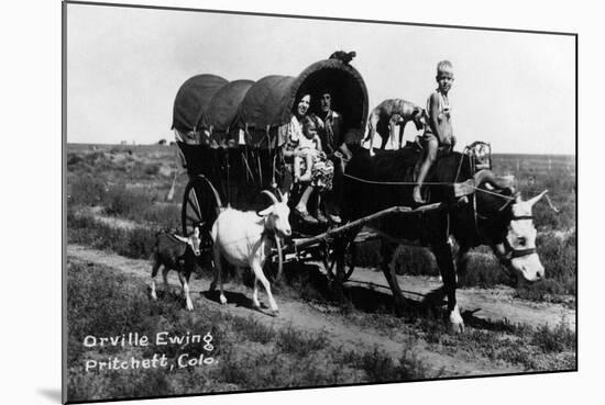 Pritchett, Colorado - Orville Ewing; Covered Wagon Scene-Lantern Press-Mounted Art Print