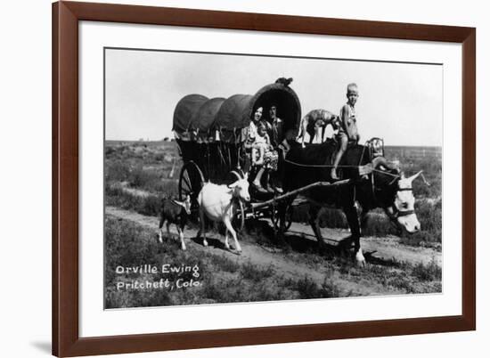 Pritchett, Colorado - Orville Ewing; Covered Wagon Scene-Lantern Press-Framed Art Print