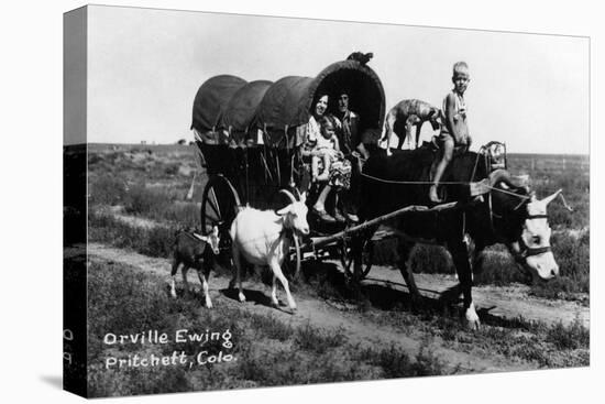 Pritchett, Colorado - Orville Ewing; Covered Wagon Scene-Lantern Press-Stretched Canvas