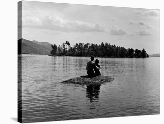 Private Island, Young Couple Embracing on a Small Rock Protruding from the Waters of Lake George-Nina Leen-Stretched Canvas
