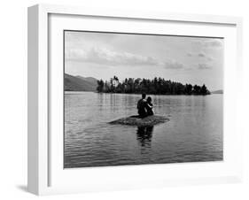 Private Island, Young Couple Embracing on a Small Rock Protruding from the Waters of Lake George-Nina Leen-Framed Photographic Print