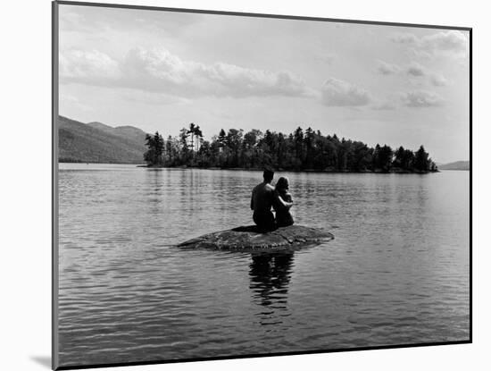 Private Island, Young Couple Embracing on a Small Rock Protruding from the Waters of Lake George-Nina Leen-Mounted Photographic Print