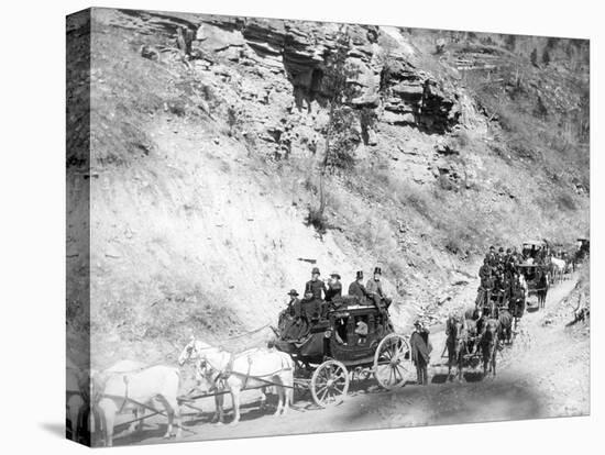 Procession of Stagecoaches Coming down Mountain Road Photograph - Deadwood, SD-Lantern Press-Stretched Canvas