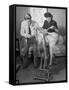 Producer-Director Preston Sturges and His Secretary Trying Out an Exercise Bicycle-John Florea-Framed Stretched Canvas