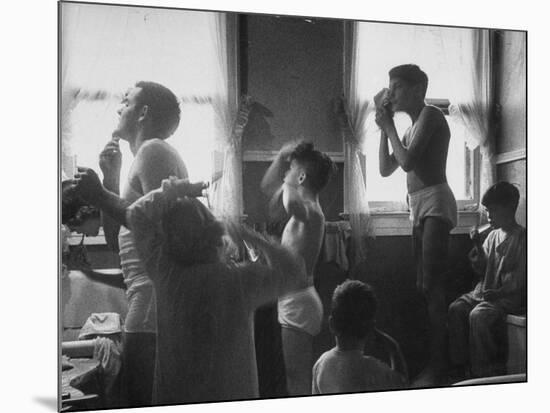 Professional Couple's Big Family, Sharing the Only Bathroom, Early in the Morning-Gordon Parks-Mounted Photographic Print