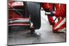 Professional Racing Team at Work during a Pitstop of a Race Car in the Pitslane during a Car Race.-Corepics VOF-Mounted Photographic Print