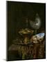 Pronk Still Life with Holbein Bowl, Nautilus Cup, Glass Goblet and Fruit Dish, 1678-Willem Kalf-Mounted Giclee Print