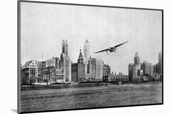 Propeller Aircraft in Chicago-null-Mounted Photographic Print