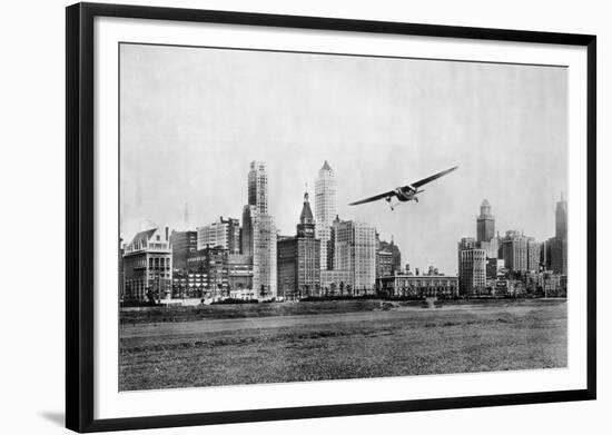 Propeller Aircraft in Chicago-null-Framed Photographic Print