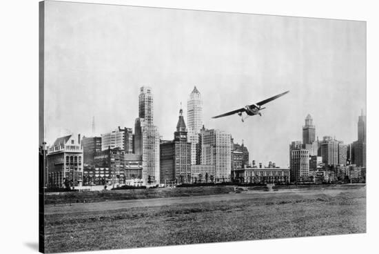 Propeller Aircraft in Chicago-null-Stretched Canvas
