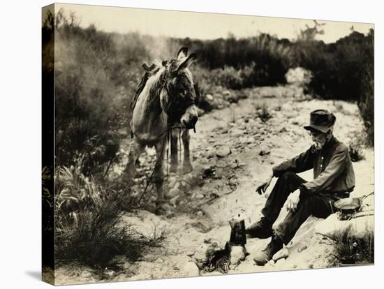 Prospector Preparing Meal for Himself-null-Stretched Canvas