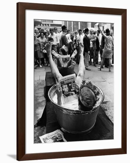 Protesters Sit in Bath Tubs and Read the Satirical Newspaper "Pardon"-null-Framed Photographic Print