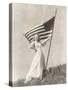 Proud Woman in Gown Holding American Flag on Hill-null-Stretched Canvas