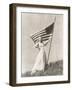Proud Woman in Gown Holding American Flag on Hill-null-Framed Photo