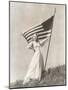 Proud Woman in Gown Holding American Flag on Hill-null-Mounted Photo