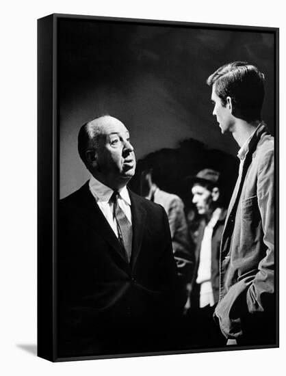 PSYCHO, 1960 directed by ALFRED HITCHCOCK On the set, Alfred Hitchcock and Anthony Perkins (b/w pho-null-Framed Stretched Canvas