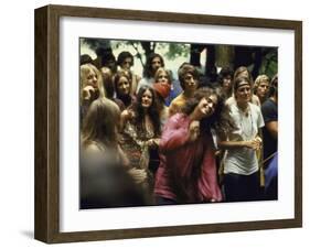 Psylvia, Dressed in Pink Indian Shirt Dancing in Crowd, Woodstock Music and Art Festival-Bill Eppridge-Framed Premium Photographic Print