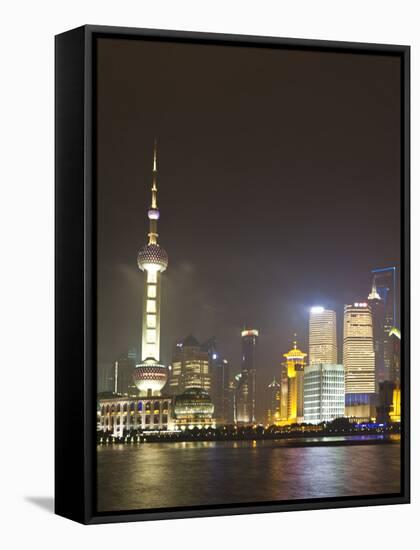 Pudong Financial District and Oriental Pearl Tower across the Huangpu River, Shanghai, China, Asia-Amanda Hall-Framed Stretched Canvas