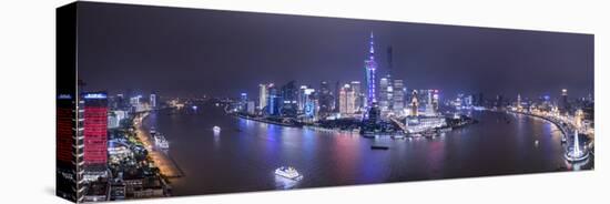 Pudong Skyline across the Huangpu River, Shanghai, China-Jon Arnold-Stretched Canvas