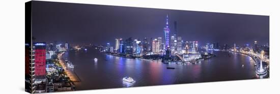 Pudong Skyline across the Huangpu River, Shanghai, China-Jon Arnold-Stretched Canvas