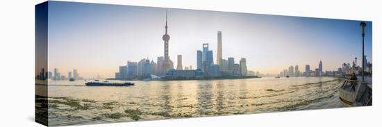 Pudong Skyline across the Huangpu River, the Bund, Shanghai, China-Jon Arnold-Stretched Canvas