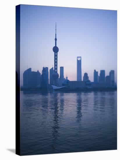 Pudong Skyline and Oriental Pearl Tower, Pudong District, Shanghai, China-Walter Bibikow-Stretched Canvas