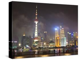 Pudong Skyline at Night across the Huangpu River, Oriental Pearl Tower on Left, Shanghai, China, As-Amanda Hall-Stretched Canvas