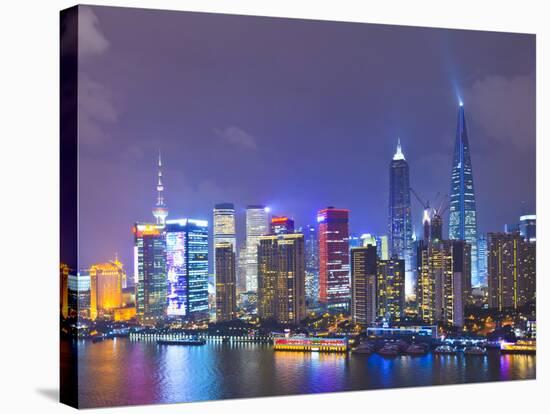 Pudong Skyline at Night across the Huangpu River, Shanghai, China, Asia-Amanda Hall-Stretched Canvas