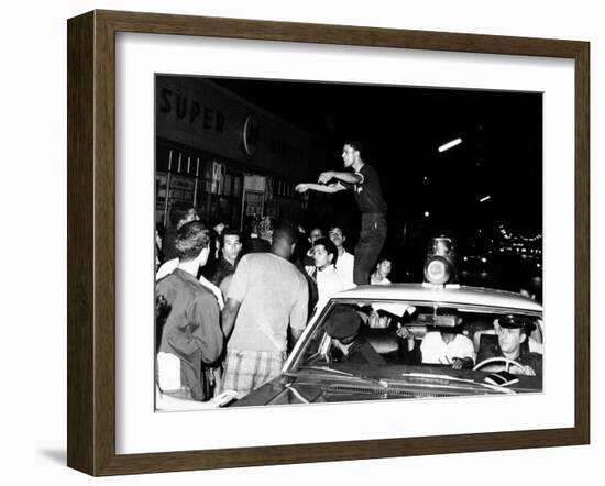 Puerto Rican Youth Urges the Crowd to Go Home and Aid in Dispersing Neighborhood Groups-null-Framed Photo