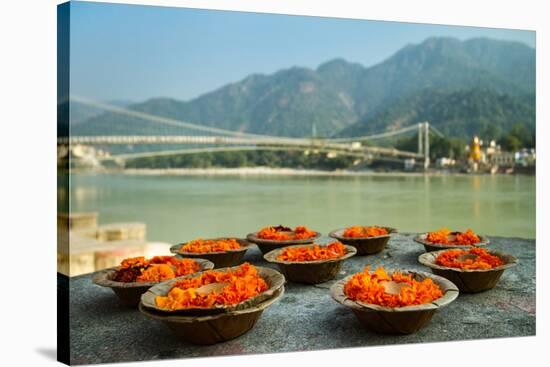Puja Flowers Offering for the Ganges River in Rishikesh, India-mazzzur-Stretched Canvas