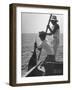 Pulling Quickly, the Beaten Fish Is Taken Aboard the Boat by Gloved Crew Member-null-Framed Premium Photographic Print