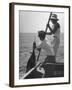 Pulling Quickly, the Beaten Fish Is Taken Aboard the Boat by Gloved Crew Member-null-Framed Photographic Print