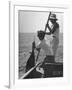 Pulling Quickly, the Beaten Fish Is Taken Aboard the Boat by Gloved Crew Member-null-Framed Photographic Print