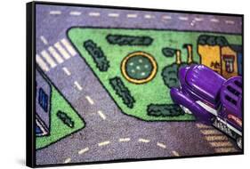 Purple Toy Car on Street Mat-null-Framed Stretched Canvas