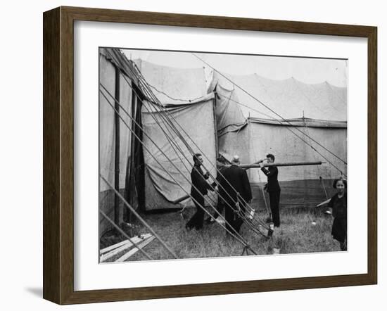 Putting Up a Marquee-null-Framed Photographic Print