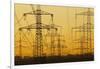 Pylons and power lines in morning light, Germany, Europe-Hans-Peter Merten-Framed Photographic Print
