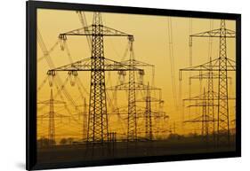 Pylons and power lines in morning light, Germany, Europe-Hans-Peter Merten-Framed Photographic Print