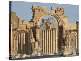 Qala'At Ibn Maan Castle Seen Through Monumental Arch, Archaelogical Ruins, Palmyra, Syria-Christian Kober-Stretched Canvas