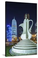 Qatar, Doha, Doha Bay, West Bay Skyscrapers, Dusk, with Large Coffeepot Sculpture-Walter Bibikow-Stretched Canvas