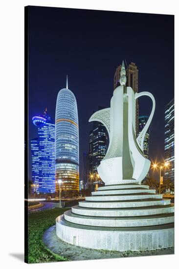 Qatar, Doha, Doha Bay, West Bay Skyscrapers, Dusk, with Large Coffeepot Sculpture-Walter Bibikow-Stretched Canvas