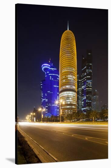 Qatar, Doha, Doha Bay, West Bay Skyscrapers Dusk, with World Trade Center , Gold-Walter Bibikow-Stretched Canvas