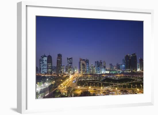 Qatar, Doha, Doha Bay, West Bay Skyscrapers, Elevated View, Dusk-Walter Bibikow-Framed Photographic Print