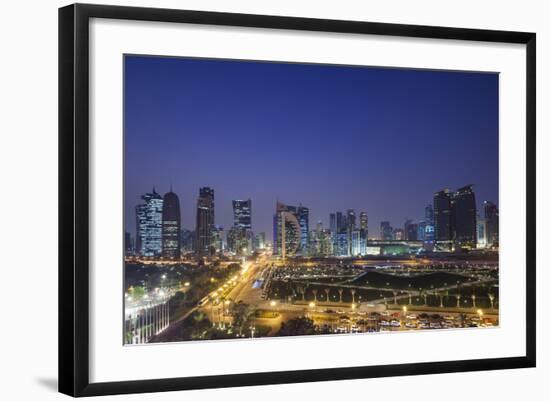 Qatar, Doha, Doha Bay, West Bay Skyscrapers, Elevated View, Dusk-Walter Bibikow-Framed Photographic Print