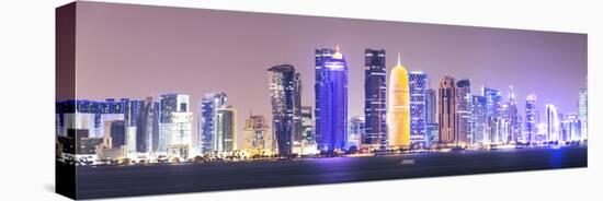 Qatar, Doha. Skyline with Skyscrapers, at Night from the Corniche-Matteo Colombo-Stretched Canvas