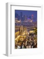 Qatar, Doha, Souq Waqif, redeveloped bazaar area, elevated view with West Bay skyscrapers from one -Walter Bibikw-Framed Photographic Print