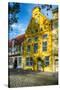 Quaint Yellow House In Old Town Lubeck-George Oze-Stretched Canvas