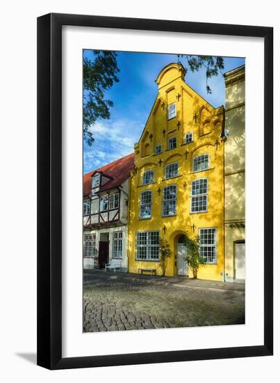 Quaint Yellow House In Old Town Lubeck-George Oze-Framed Photographic Print